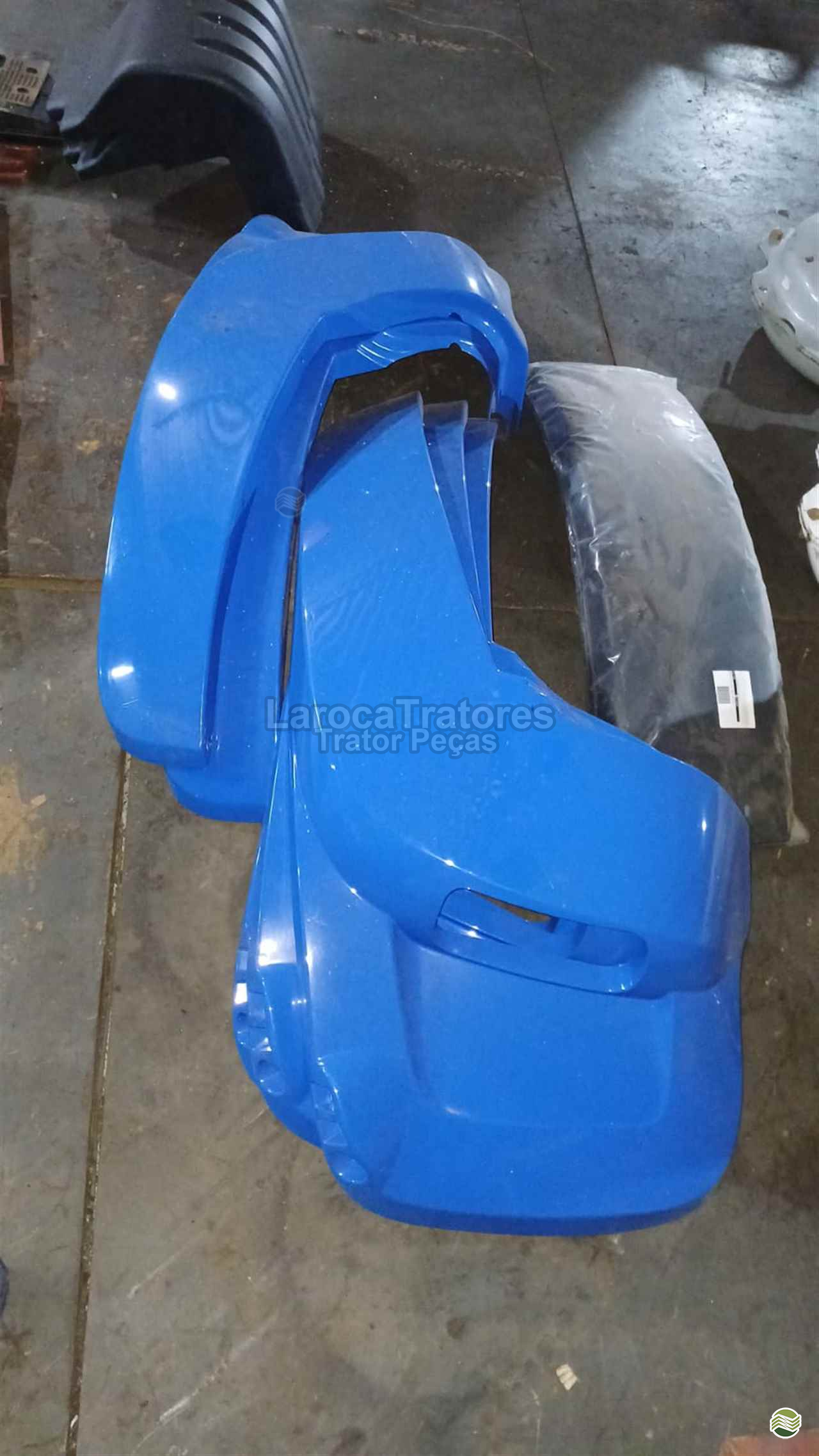 PARALAMA TRASEIRO NEW HOLLAND